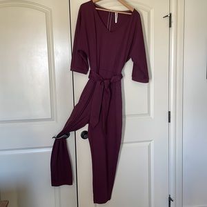 Anthropologie jump suit. Plum colour in a soft fabric perfect for fall. Size L.